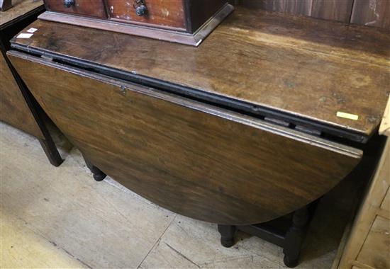 Oak oval drop leaf gateleg table(-)